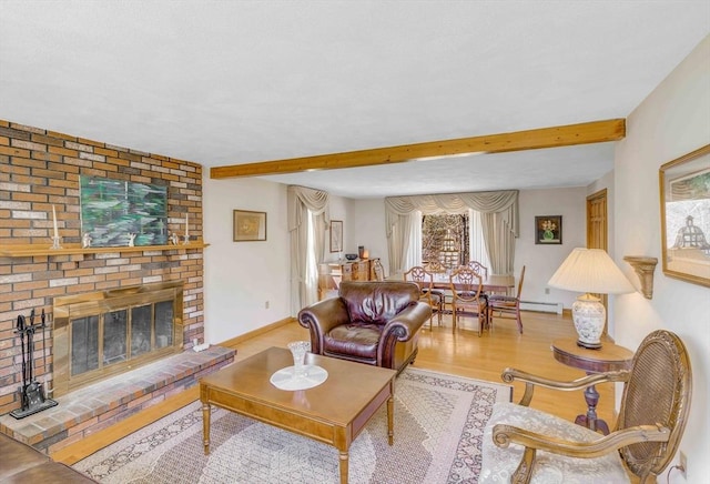 6 Boyd Dr, Newburyport, MA 01950 - living room with wood finished floors, beam ceiling, and a brick fireplace