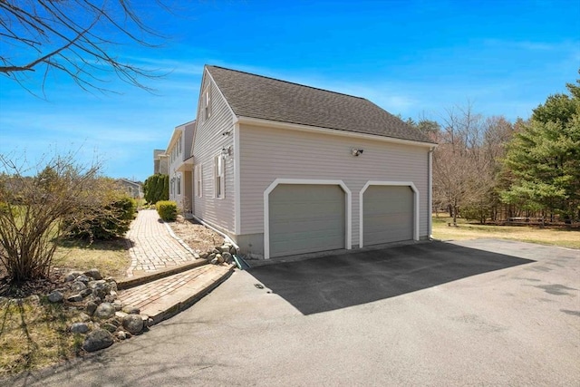 6 Boyd Dr, Newburyport, MA 01950 - view of side of home featuring driveway