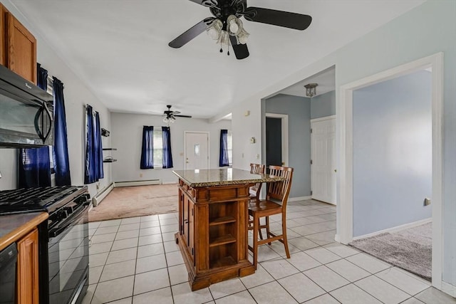 394 Huttleston Ave, Fairhaven, MA 02719 - kitchen with black appliances, brown cabinets, light colored carpet, and light tile patterned floors