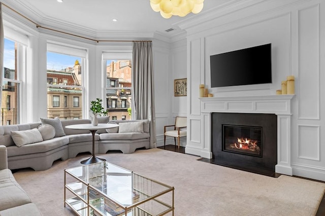 128 Marlborough St Unit 6, Boston, MA 02116 - living area with ornamental molding, a decorative wall, and a fireplace with flush hearth