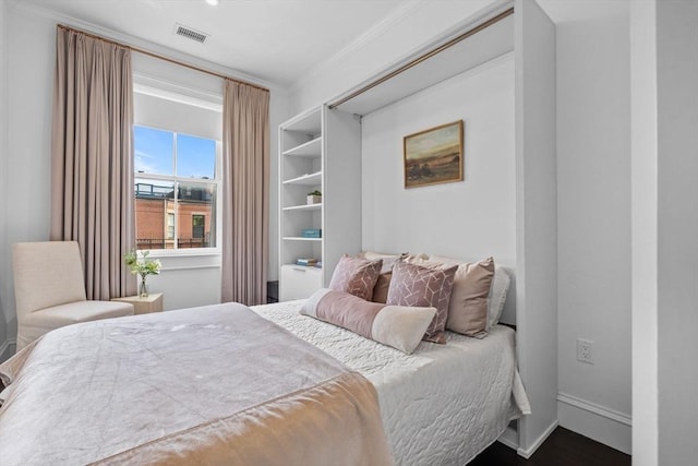 128 Marlborough St Unit 6, Boston, MA 02116 - bedroom featuring crown molding, baseboards, and wood finished floors