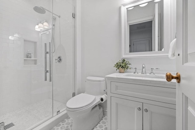 128 Marlborough St Unit 6, Boston, MA 02116 - bathroom with toilet, a stall shower, vanity, and tile patterned floors