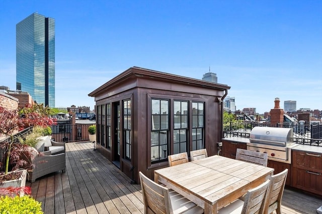 128 Marlborough St Unit 6, Boston, MA 02116 - deck with a view of city and outdoor dining area