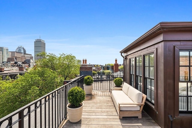 128 Marlborough St Unit 6, Boston, MA 02116 - wooden deck featuring a city view