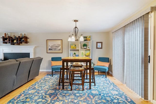 dining area with light wood-type flooring