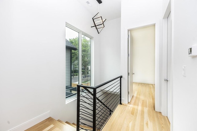 93 Griswold St Unit 93, Cambridge, MA 02138 - hallway with an upstairs landing, light wood-type flooring, and baseboards