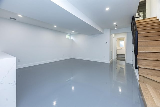 93 Griswold St Unit 93, Cambridge, MA 02138 - basement featuring stairs, baseboards, and recessed lighting