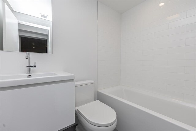 93 Griswold St Unit 93, Cambridge, MA 02138 - bathroom with toilet, vanity, and  shower combination