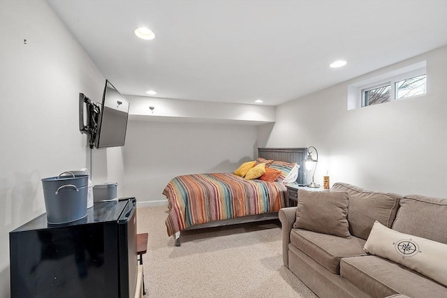 bedroom with light carpet, baseboards, and recessed lighting