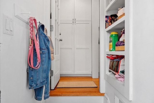 mudroom with wood finished floors