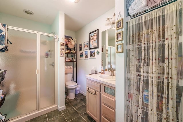 64 Porcupine Point Rd, Tolland, MA 01034 - bathroom featuring vanity, a stall shower, tile patterned floors, and toilet
