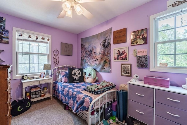 64 Porcupine Point Rd, Tolland, MA 01034 - carpeted bedroom with multiple windows and a ceiling fan