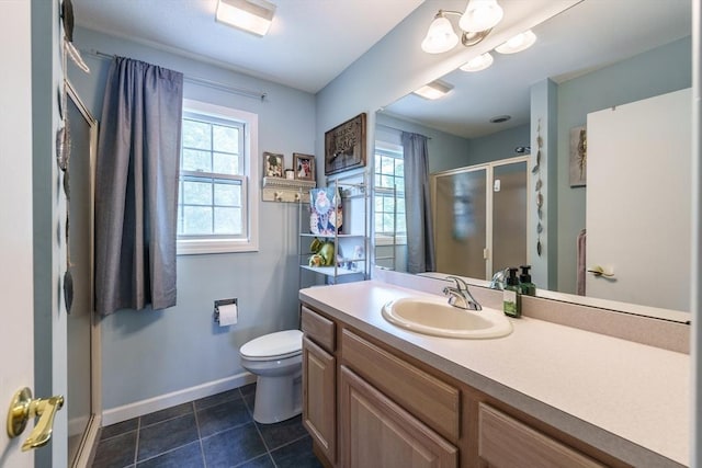 64 Porcupine Point Rd, Tolland, MA 01034 - bathroom featuring healthy amount of natural light, a stall shower, vanity, and toilet