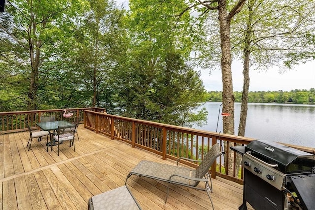 64 Porcupine Point Rd, Tolland, MA 01034 - wooden deck with grilling area, a water view, and outdoor dining area