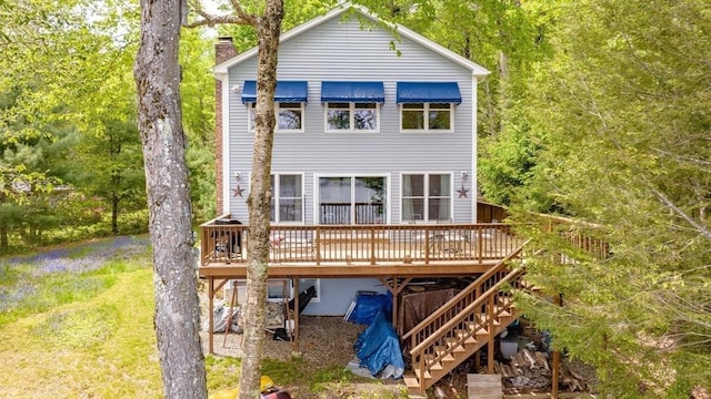 64 Porcupine Point Rd, Tolland, MA 01034 - back of house with a wooden deck, a chimney, and stairway