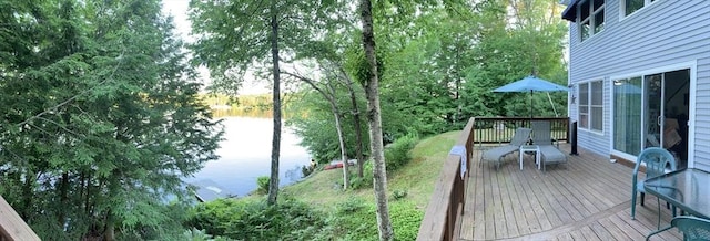 64 Porcupine Point Rd, Tolland, MA 01034 - wooden terrace with a water view