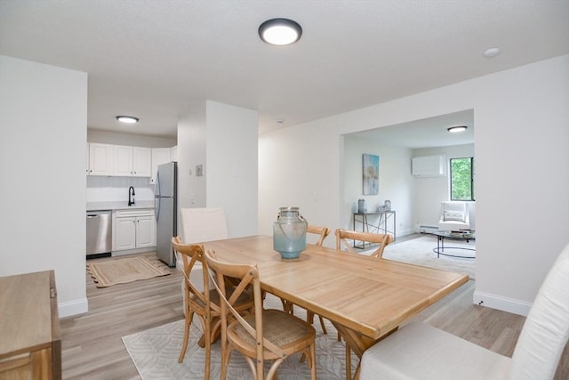 45 Macy St Unit 200A, Amesbury, MA 01913 - dining space with light wood-type flooring