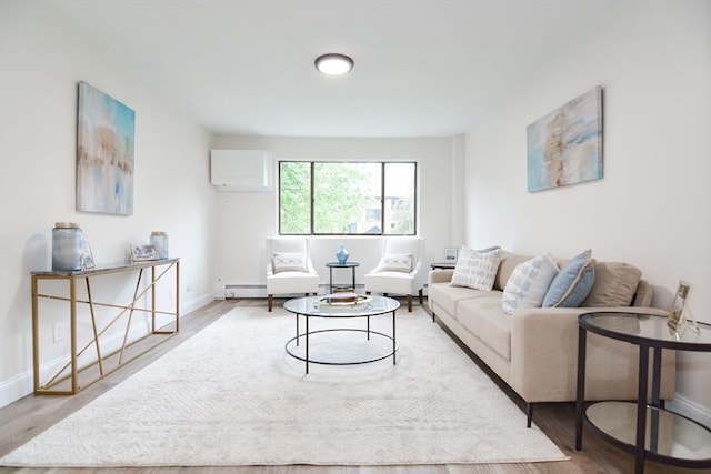 45 Macy St Unit 200A, Amesbury, MA 01913 - living room featuring light wood finished floors and a baseboard heating unit