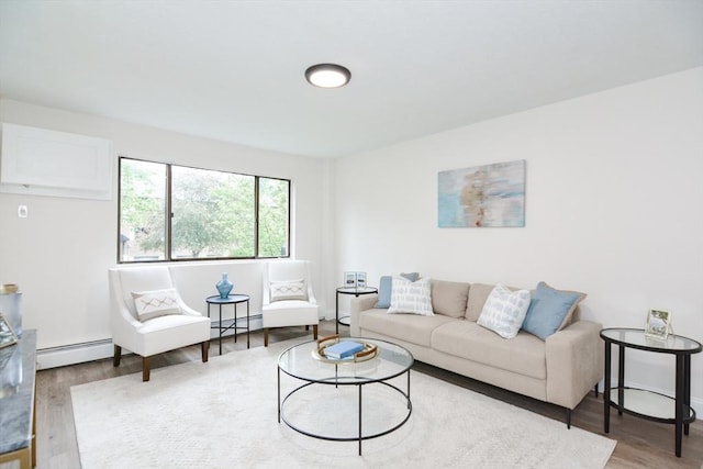 45 Macy St Unit 200A, Amesbury, MA 01913 - living area with a baseboard radiator and wood finished floors
