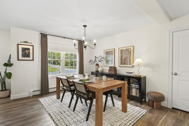 1076 King Phillip Trl, Templeton, MA 01468 - dining area featuring a chandelier, wood finished floors, a baseboard heating unit, and baseboards
