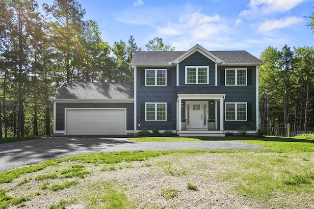 1076 King Phillip Trl, Templeton, MA 01468 - colonial house featuring asphalt driveway, an attached garage, and a front yard