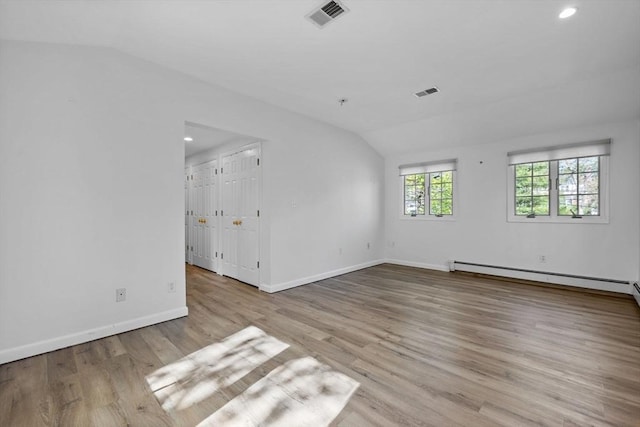43 Grove Hill Park, Newton, MA 02460 - unfurnished room with vaulted ceiling, wood finished floors, baseboards, and recessed lighting