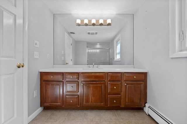 43 Grove Hill Park, Newton, MA 02460 - full bath with a baseboard heating unit, a shower with shower door, vanity, and tile patterned floors