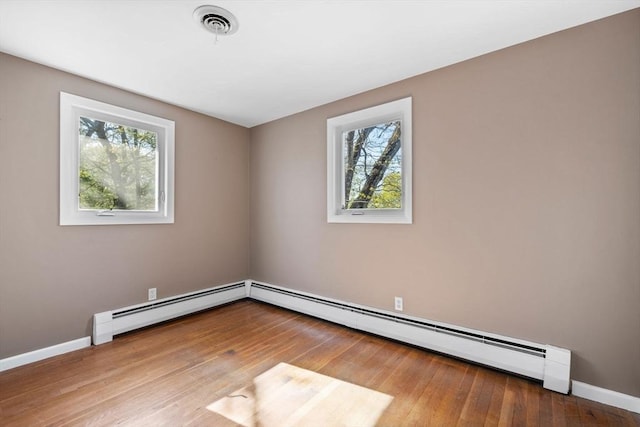 43 Grove Hill Park, Newton, MA 02460 - spare room with baseboards and wood finished floors