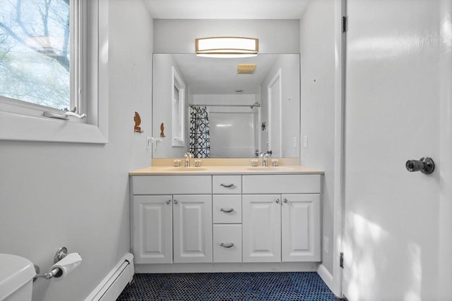 43 Grove Hill Park, Newton, MA 02460 - bathroom featuring tile patterned flooring, curtained shower, double vanity, and a baseboard radiator