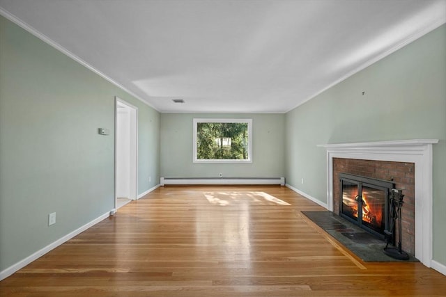 43 Grove Hill Park, Newton, MA 02460 - unfurnished living room featuring baseboard heating, a fireplace, ornamental molding, wood finished floors, and baseboards
