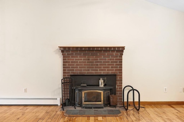 728 River St, Winchendon, MA 01475 - detailed view of a baseboard radiator, wood finished floors, and baseboards