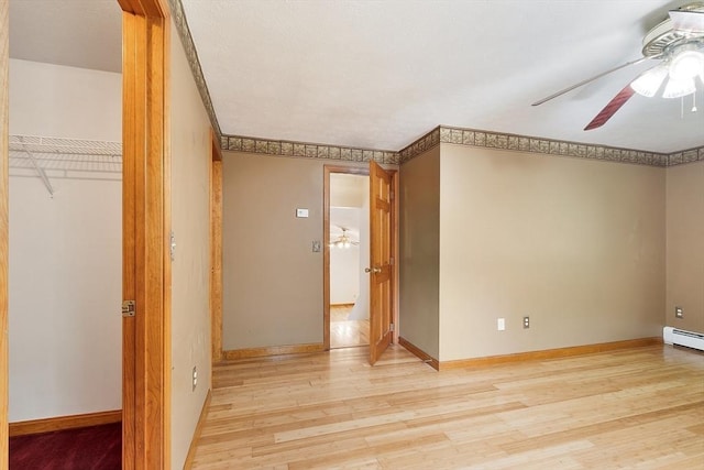 728 River St, Winchendon, MA 01475 - empty room featuring a ceiling fan, light wood-style floors, and baseboards