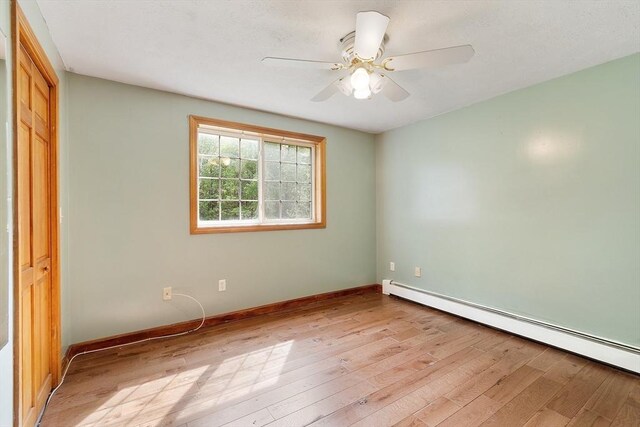 728 River St, Winchendon, MA 01475 - unfurnished room with baseboard heating, light wood-type flooring, baseboards, and ceiling fan