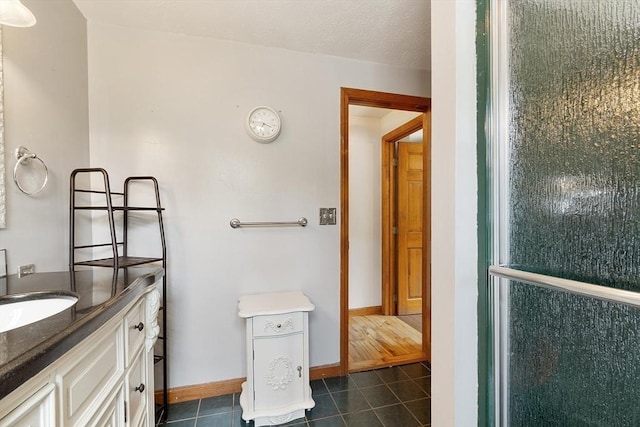 728 River St, Winchendon, MA 01475 - bathroom with tile patterned floors, vanity, and baseboards