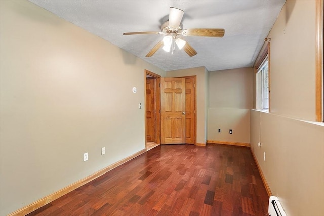728 River St, Winchendon, MA 01475 - unfurnished room with a ceiling fan, wood finished floors, baseboards, and baseboard heating