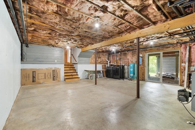 728 River St, Winchendon, MA 01475 - basement with stairs, washer / dryer, and a water pressure tank