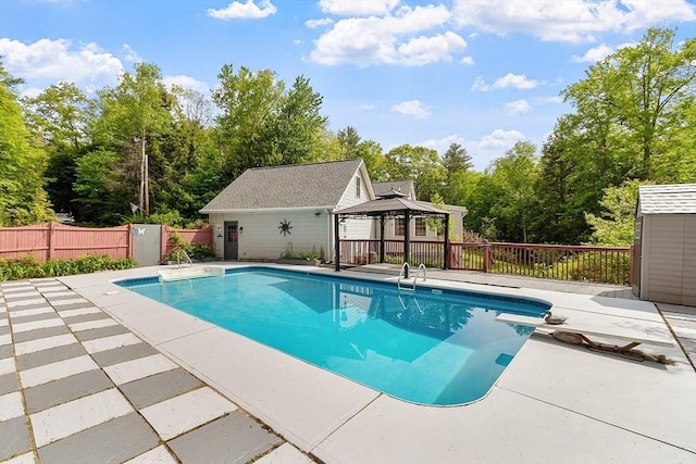 728 River St, Winchendon, MA 01475 - view of swimming pool featuring a gazebo, a patio, view of wooded area, and a diving board