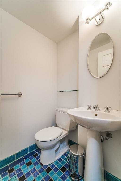 bathroom with a sink and toilet