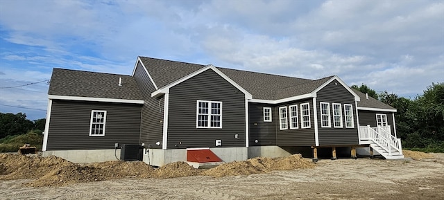 back of house with cooling unit