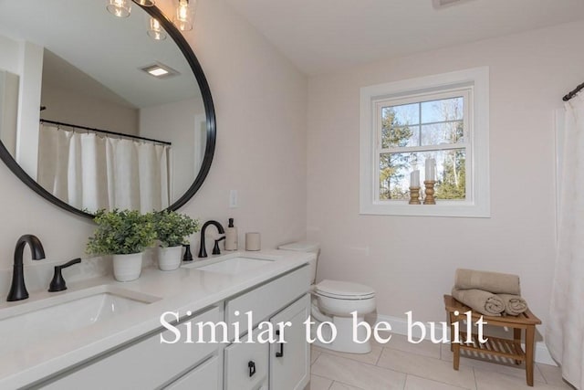 bathroom with double vanity, toilet, visible vents, and a sink