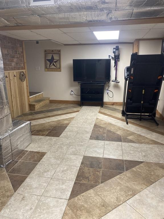 interior space featuring baseboards