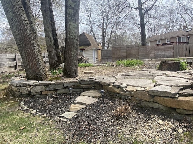 view of yard featuring fence