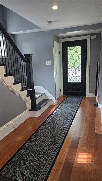 9 Venner Rd, Arlington, MA 02476 - foyer featuring wood finished floors, baseboards, stairs, and recessed lighting