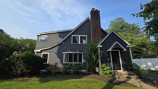9 Venner Rd, Arlington, MA 02476 - view of front of property with a chimney