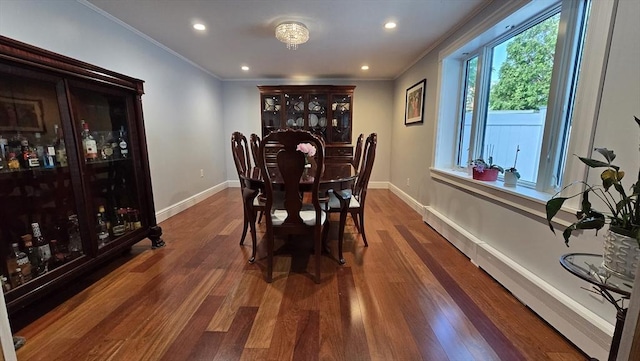 9 Venner Rd, Arlington, MA 02476 - dining area with ornamental molding, wood finished floors, baseboards, and recessed lighting