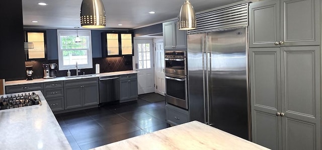 9 Venner Rd, Arlington, MA 02476 - kitchen featuring appliances with stainless steel finishes, a sink, healthy amount of natural light, light countertops, and recessed lighting