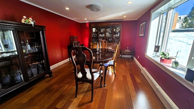 9 Venner Rd, Arlington, MA 02476 - dining area featuring ornamental molding, baseboards, wood finished floors, recessed lighting, and a baseboard heating unit