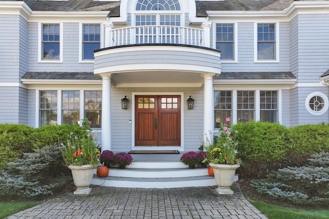 property entrance with a balcony