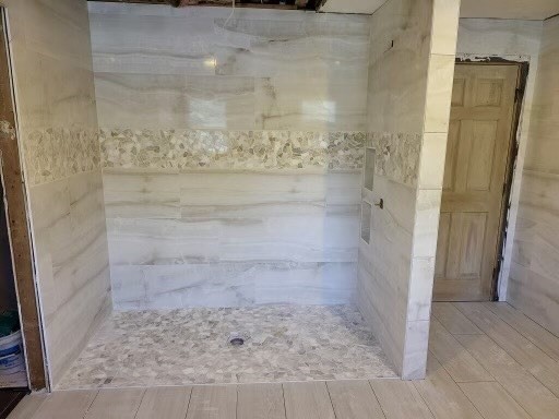 bathroom with wood-type flooring