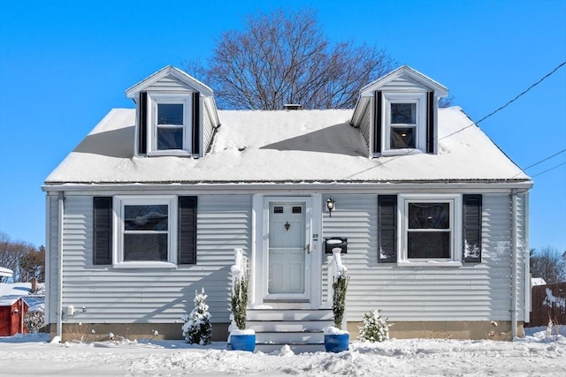 view of new england style home